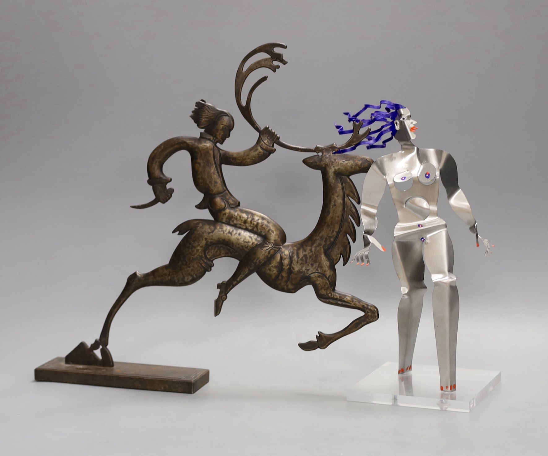 A stylised bronze figure and a metal figure of a dancer, tallest 31cm